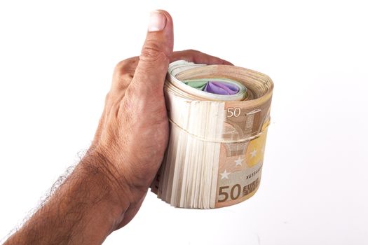 Man hand holding a bunch of euro banknotes isolated on white background