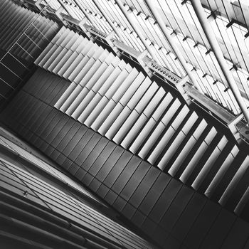 Abstract black and white interior fragment with ceiling and windows