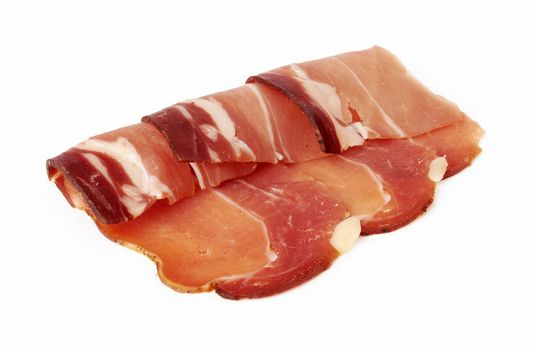 pieces of raw bacon on a white background