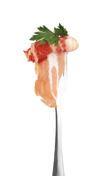 bacon on fork isolated on a white 