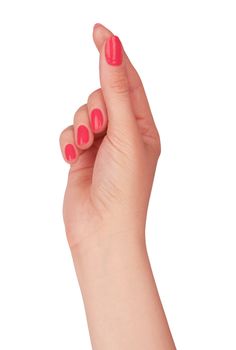 hand of a young woman with red manicure