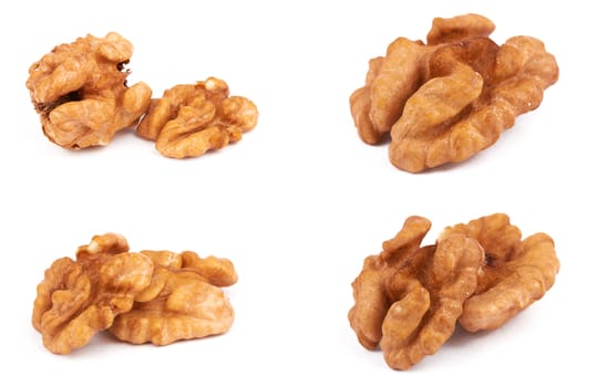 Group of peeled walnuts isolated on a white 