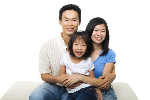 Asian family portrait on white background