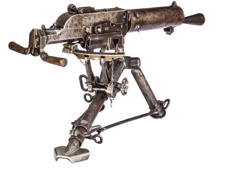 old black color machine gun on a tripod rear view isolated on white background
