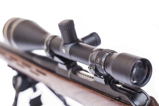 Rilfle scope closeup isolated on white background