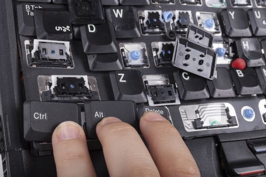 Fingers on alt crtl delete keys on broken laptop keyboard
