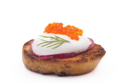 Red caviar on roasted bread and radish isolated on white background