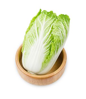 Fresh chinese cabbage in wooden bowl isolated on a white background, Save clipping path.