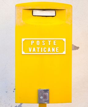 ROME, VATICAN STATE - AUGUST 19, 2018: Detail of the traditional yellow post box in Vatican City, Rome