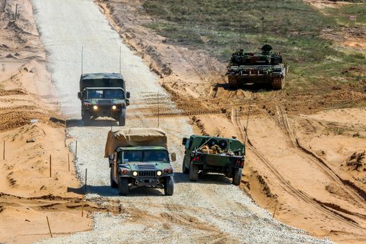 NATO soldiers and military vehicles. International Military Training "Saber Strike 2017", Adazi, Latvia, from 3 to 15 June 2017. US Army Europe-led annual International military exercise Saber Strike Field Training Exercise in Latvia.