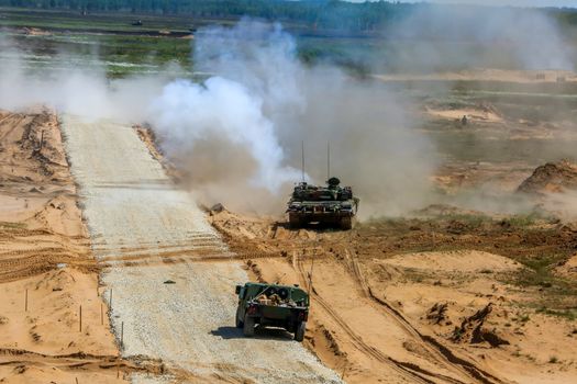 NATO soldiers and military vehicles. International Military Training "Saber Strike 2017", Adazi, Latvia, from 3 to 15 June 2017. US Army Europe-led annual International military exercise Saber Strike Field Training Exercise in Latvia.
