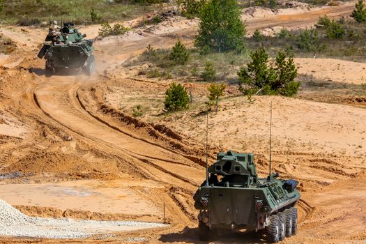 NATO soldiers and military vehicles. International Military Training "Saber Strike 2017", Adazi, Latvia, from 3 to 15 June 2017. US Army Europe-led annual International military exercise Saber Strike Field Training Exercise in Latvia.