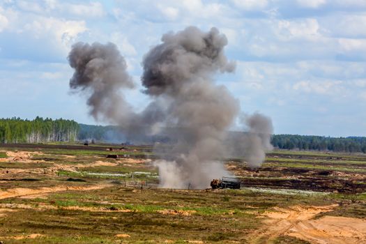Explosion and smoke. International Military Training "Saber Strike 2017", Adazi, Latvia, from 3 to 15 June 2017. US Army Europe-led annual International military exercise Saber Strike Field Training Exercise in Latvia.