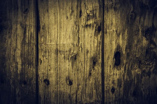 Old spoiled wood, detail of a wall decorated with abandoned wood