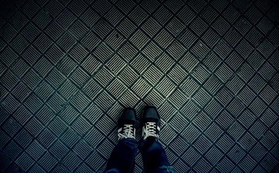 Feet with boots, urban fashion detail