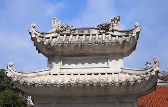 Ceramic decoration on a temple roof in Vietnam