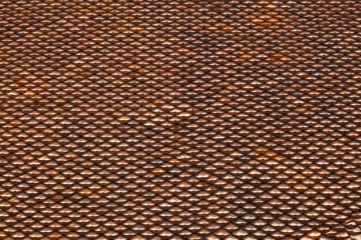 Roof of a house covered with old red tiling