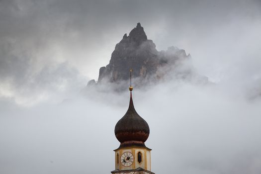 san Valentino church on a foggy late autumn day, Siusi allo Sciliar, Castelrotto, Dolomites, Italy