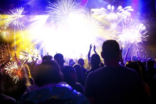 crowd watching fireworks - New Year celebrations- abstract holiday background