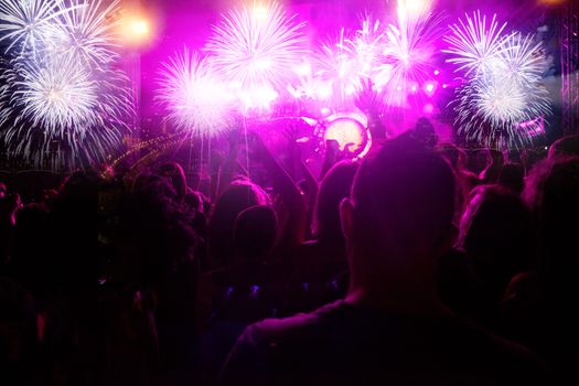 crowd watching fireworks - New Year celebrations- abstract holiday background