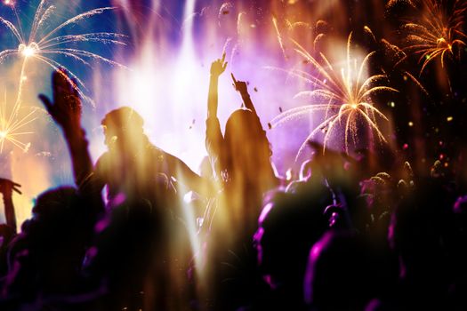 crowd watching fireworks - New Year celebrations- abstract holiday background