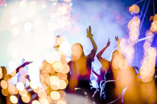 crowd watching fireworks - New Year celebrations- abstract holiday background