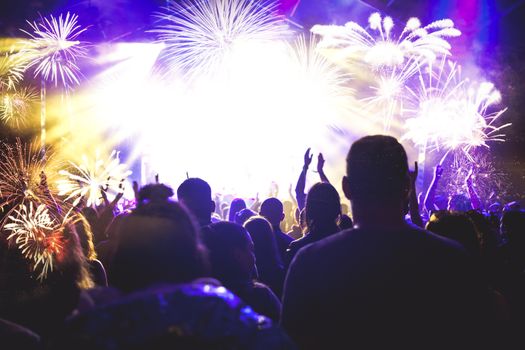 crowd watching fireworks - New Year celebrations- abstract holiday background