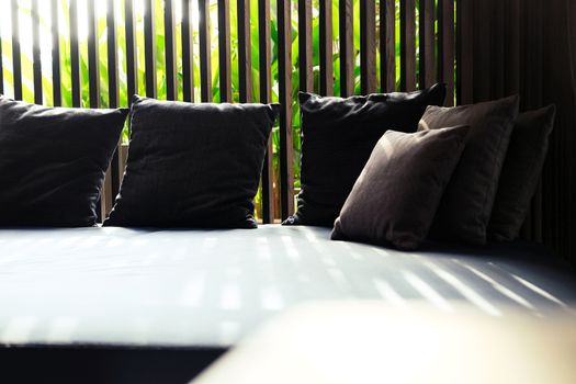 Detail of Modern living room interior with cozy sofa and pillows.