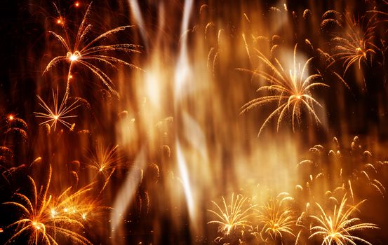 beautiful colorful fireworks at New Year and copy space - abstract holiday background