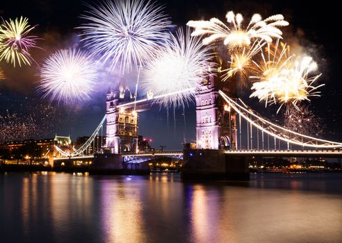 celebratory fireworks over Tower Bridge - New Year destination.  London.  UK