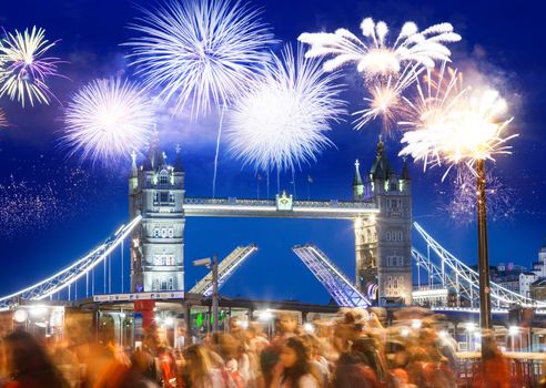 celebratory fireworks over Tower Bridge - New Year destination.  London.  UK