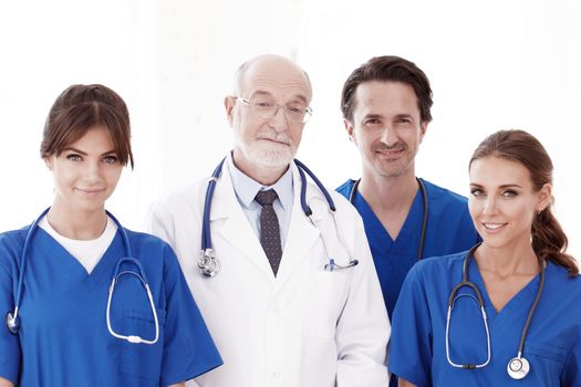 Team of professional doctors isolated on white background