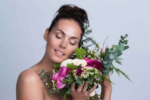 Beautiful woman with bouquet of flowers gift for valentines day