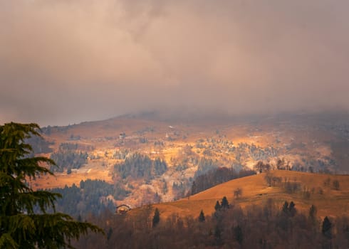 Amazing view of the Orobie Alps, autumn / winter, the mountain is a little snow-covered ,the grass is burned by the cold and turns orange.Oltre il Colle,north alps,Seriana Valley,Bergamo Italy.