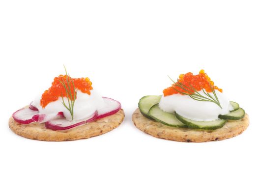 Two Red caviar on white chees  appetizer on white background