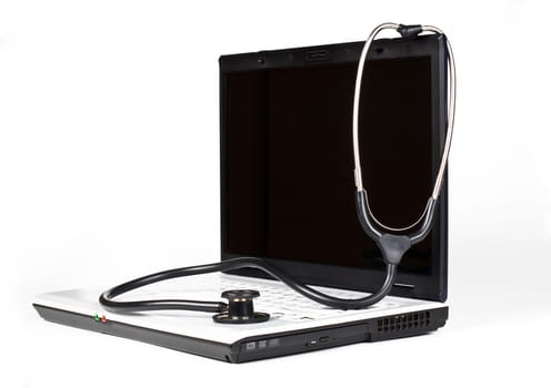 laptop with blank black screen with a black stethoscope