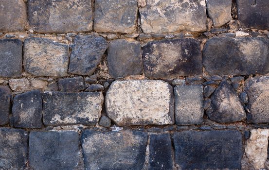 Ancient black stone wall