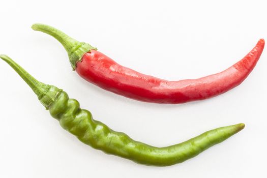 Two Isolatedon White Background Chili Peppers one REd and one Green