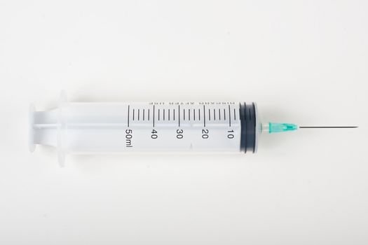 big 50ml syringe isolated on white background