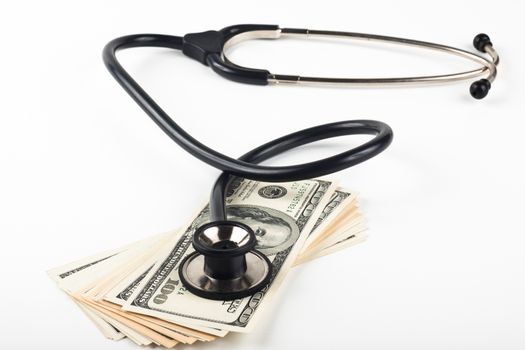 consulting dollars with a black stethoscope isolated on white background