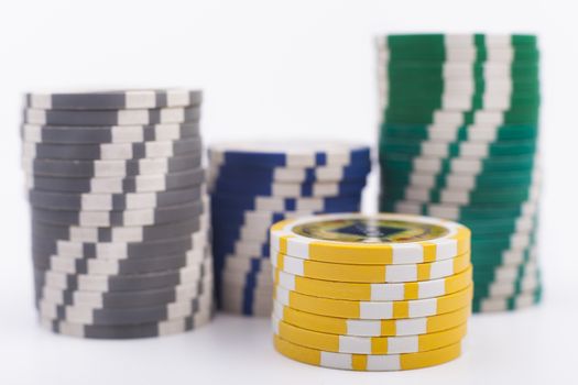 Casino chips piles isolated on white background