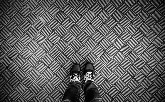 Feet with boots, urban fashion detail