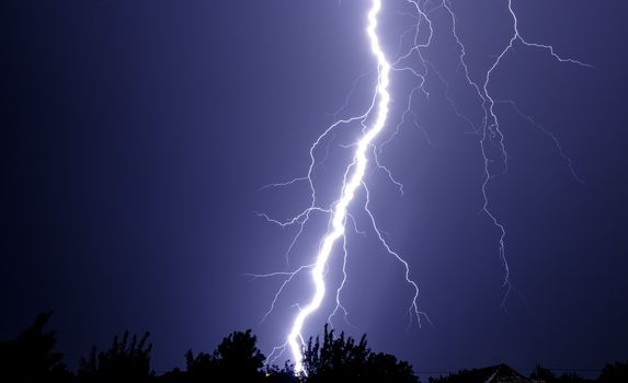 storm lightning from sky to earth at night