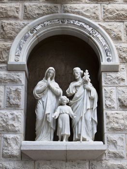 the holy family statue outside a church in nazareth