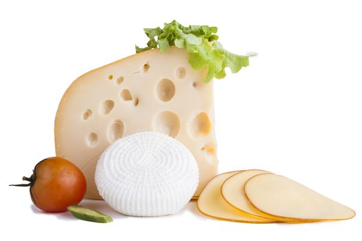 yellow cheese with a red tomato and some slices isolated on white background