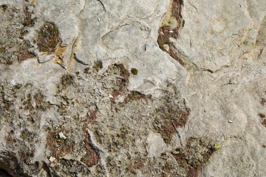 Structure of surface of the stone, used as background. Stone texture. Natural rocks