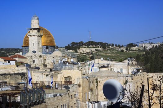 jerusalm western wall and goldem mosque blue sky