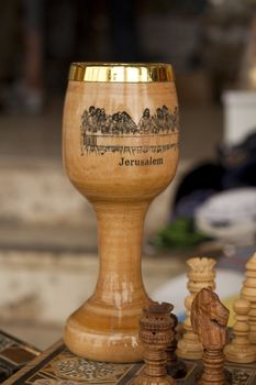 a brown dood grail with jerusalem written on it