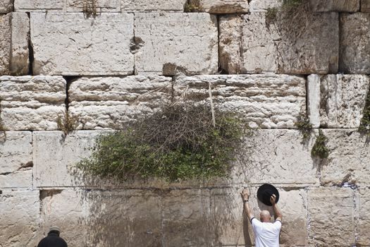 two man pary at the western wall in jerusalem