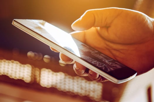 close up image of Phone on hands.